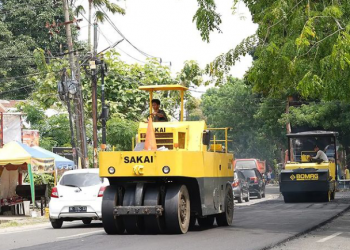 Melakukan Perbaikan Jalan di Kota Medan